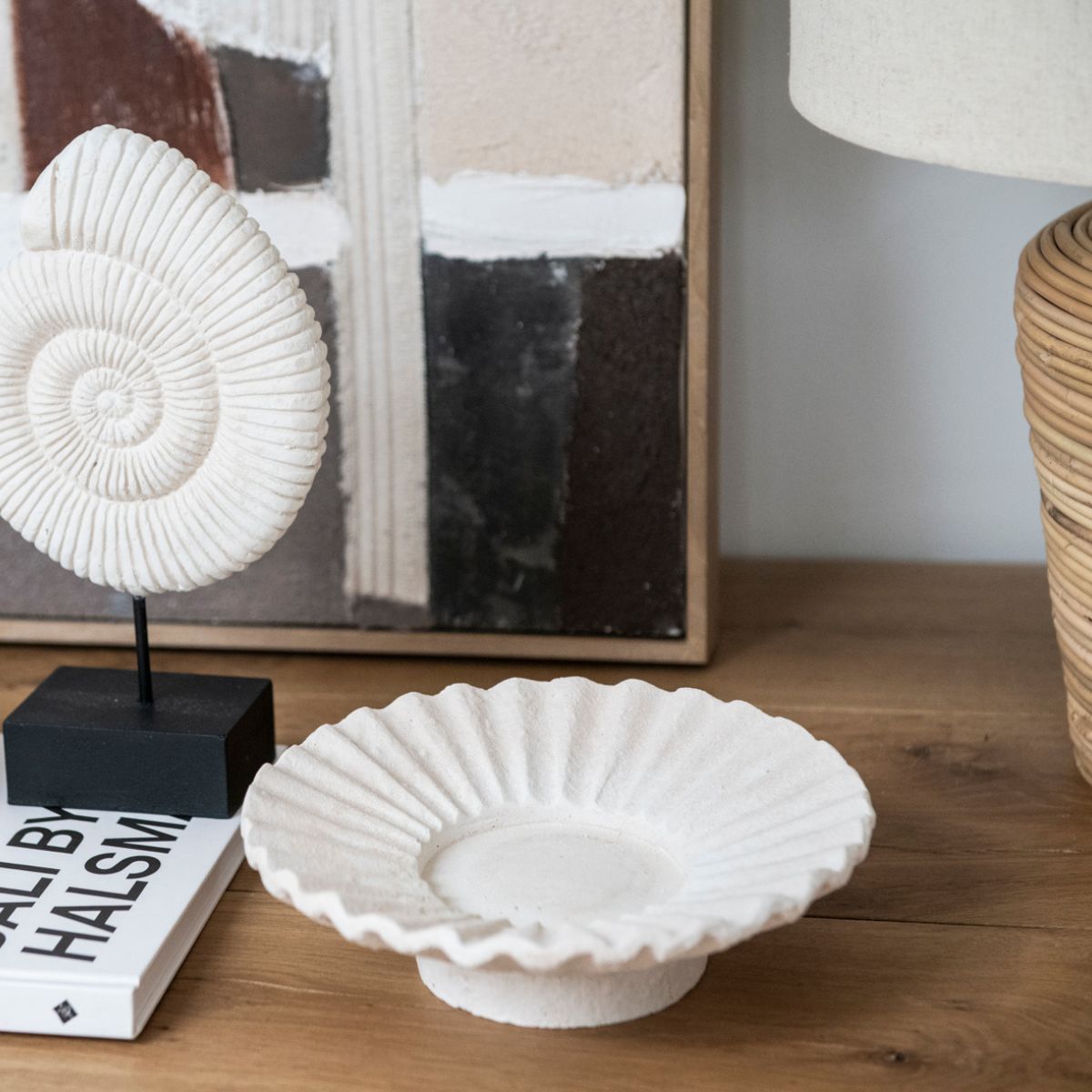 Portavelas decorativo de cemento blanco