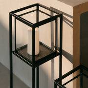 Portavelas industrial de pie negro de metal y cristal