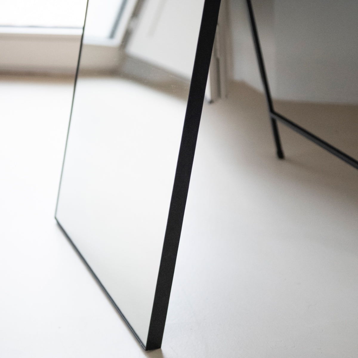 Black metal floor mirror