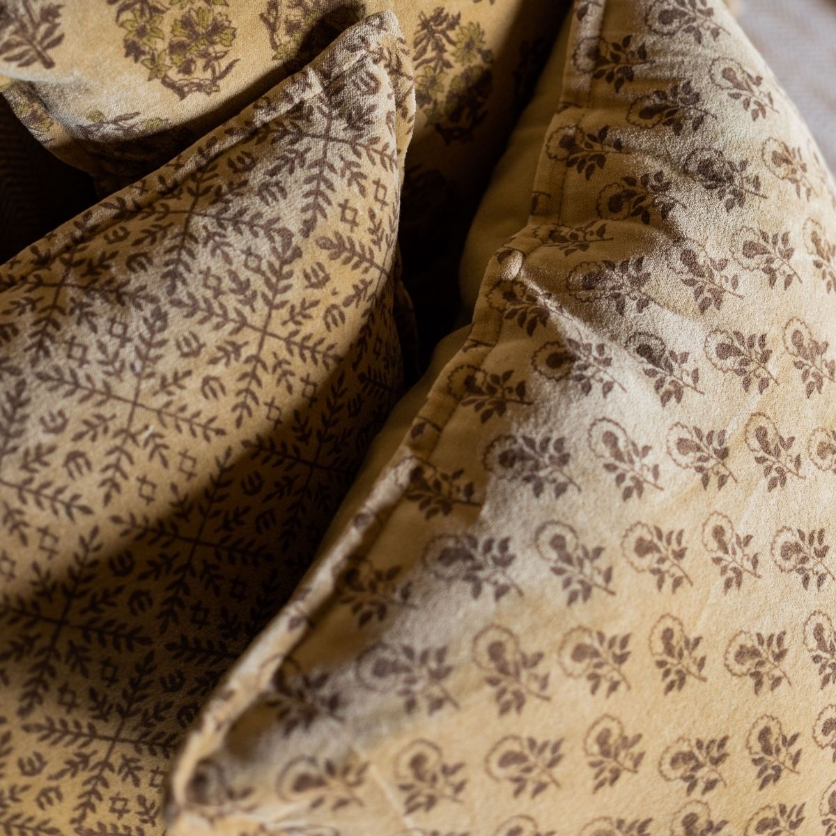 Vintage yellow velvet sofa cushion
