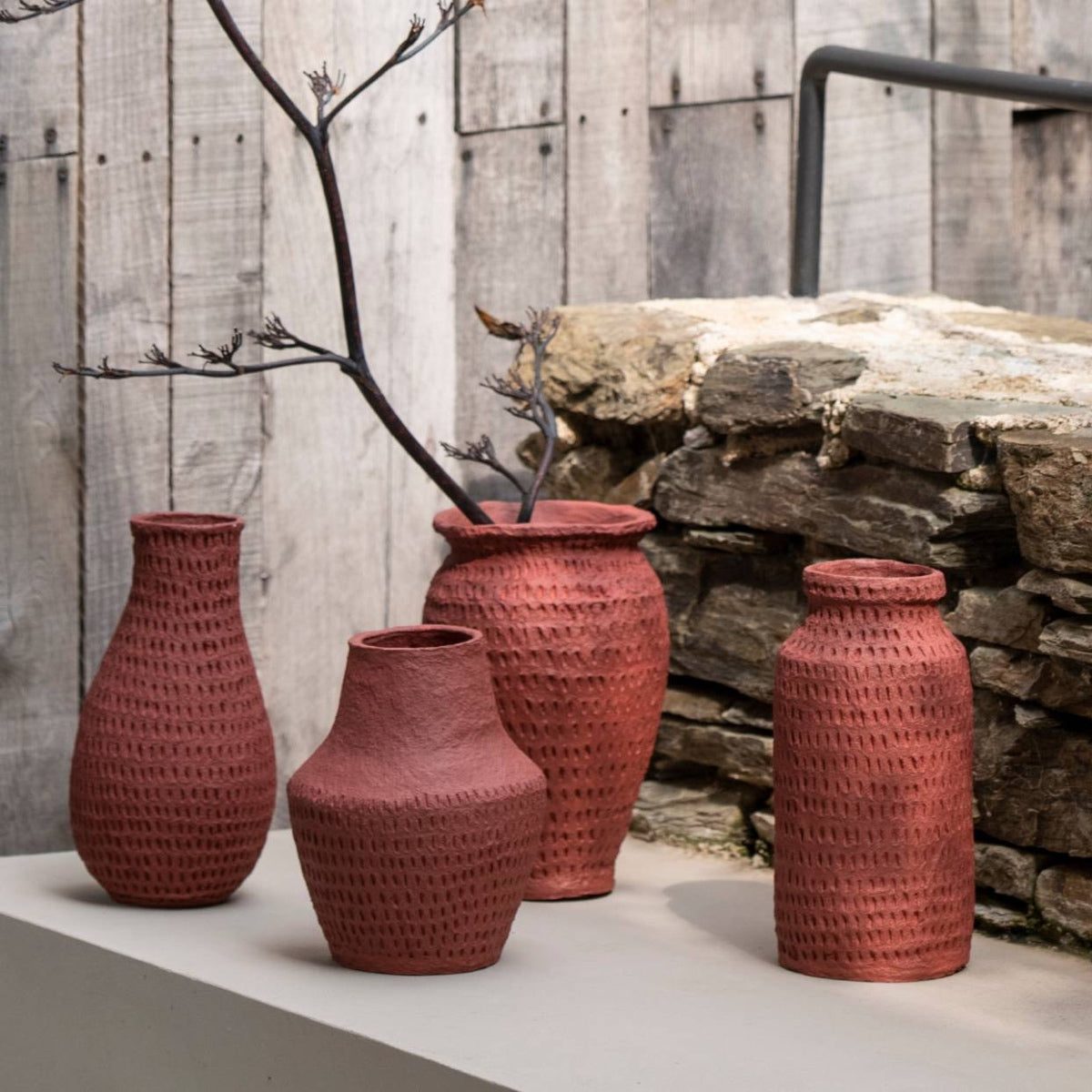 Red cotton mache vase