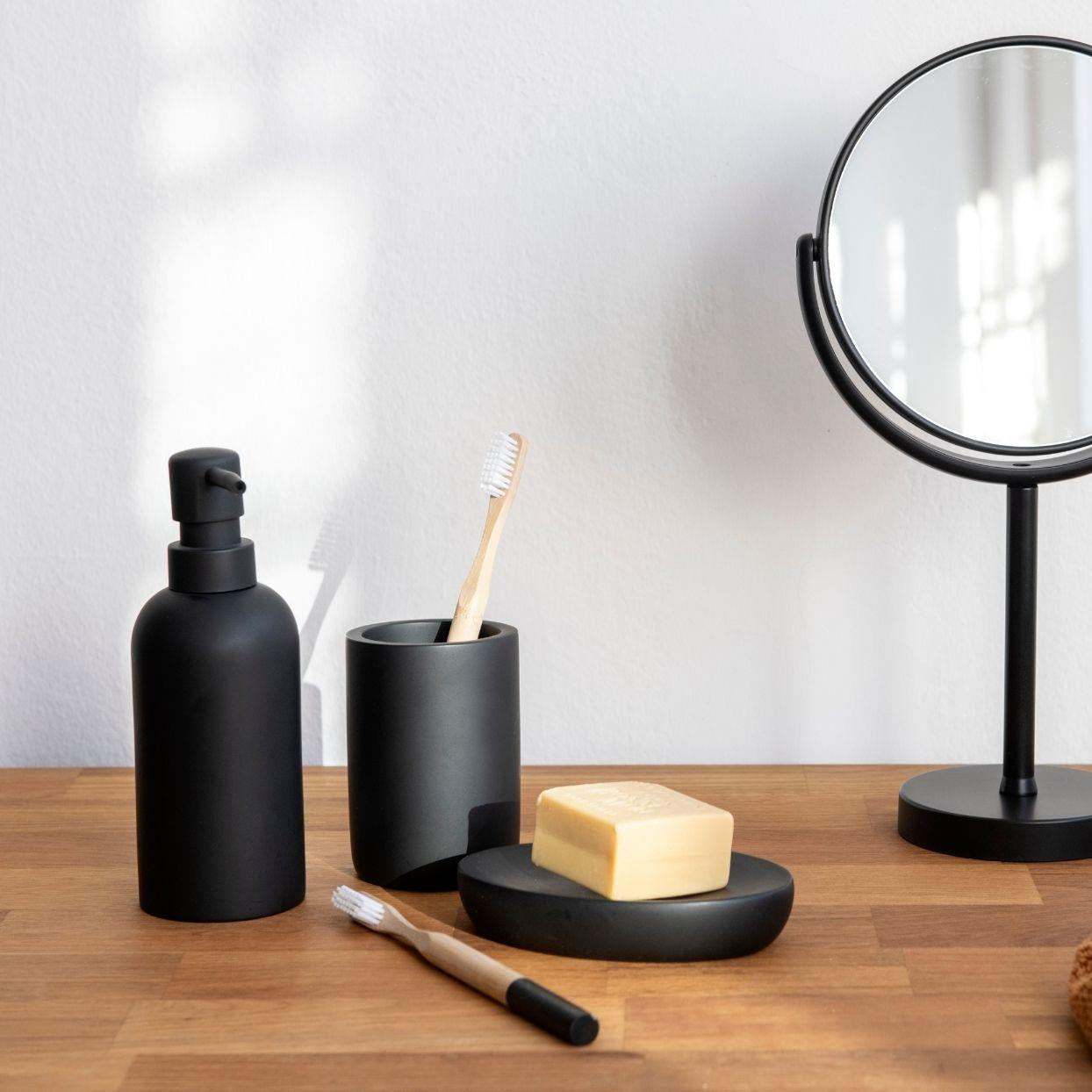 Black resin bathroom toothbrush holder