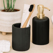 Black resin bathroom toothbrush holder