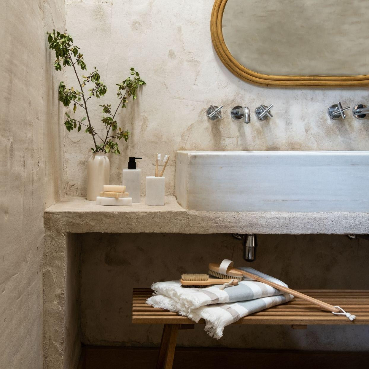 White marble bathroom dispenser