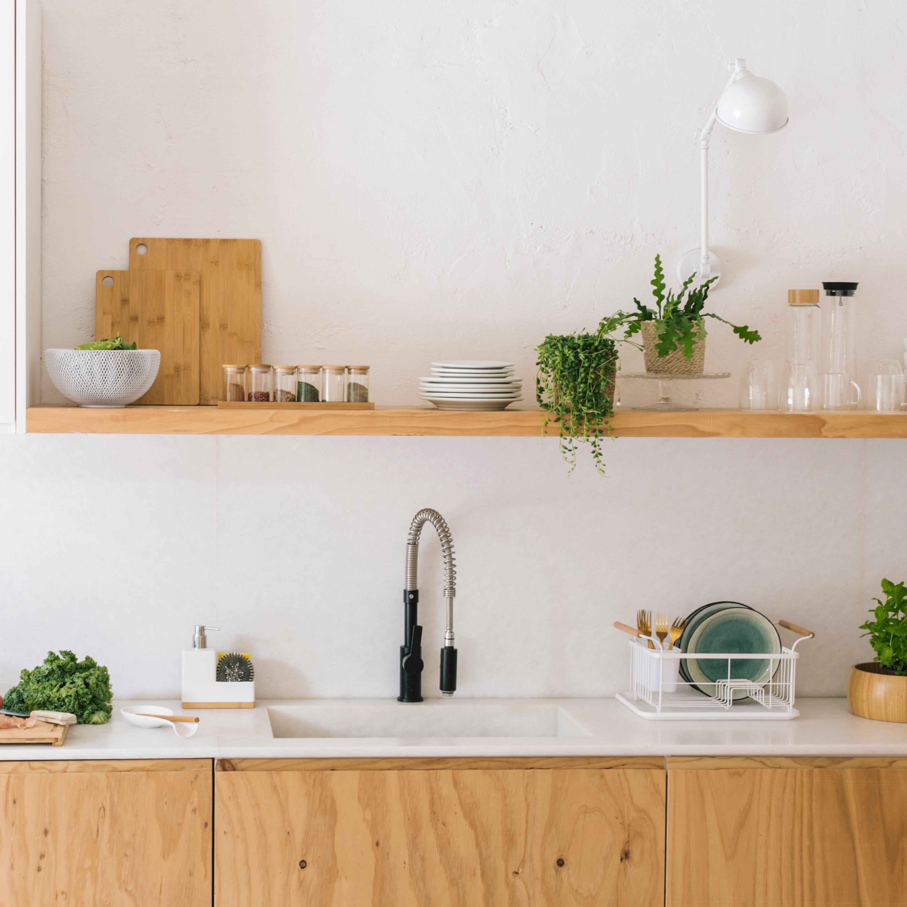 White metal kitchen dish drainer