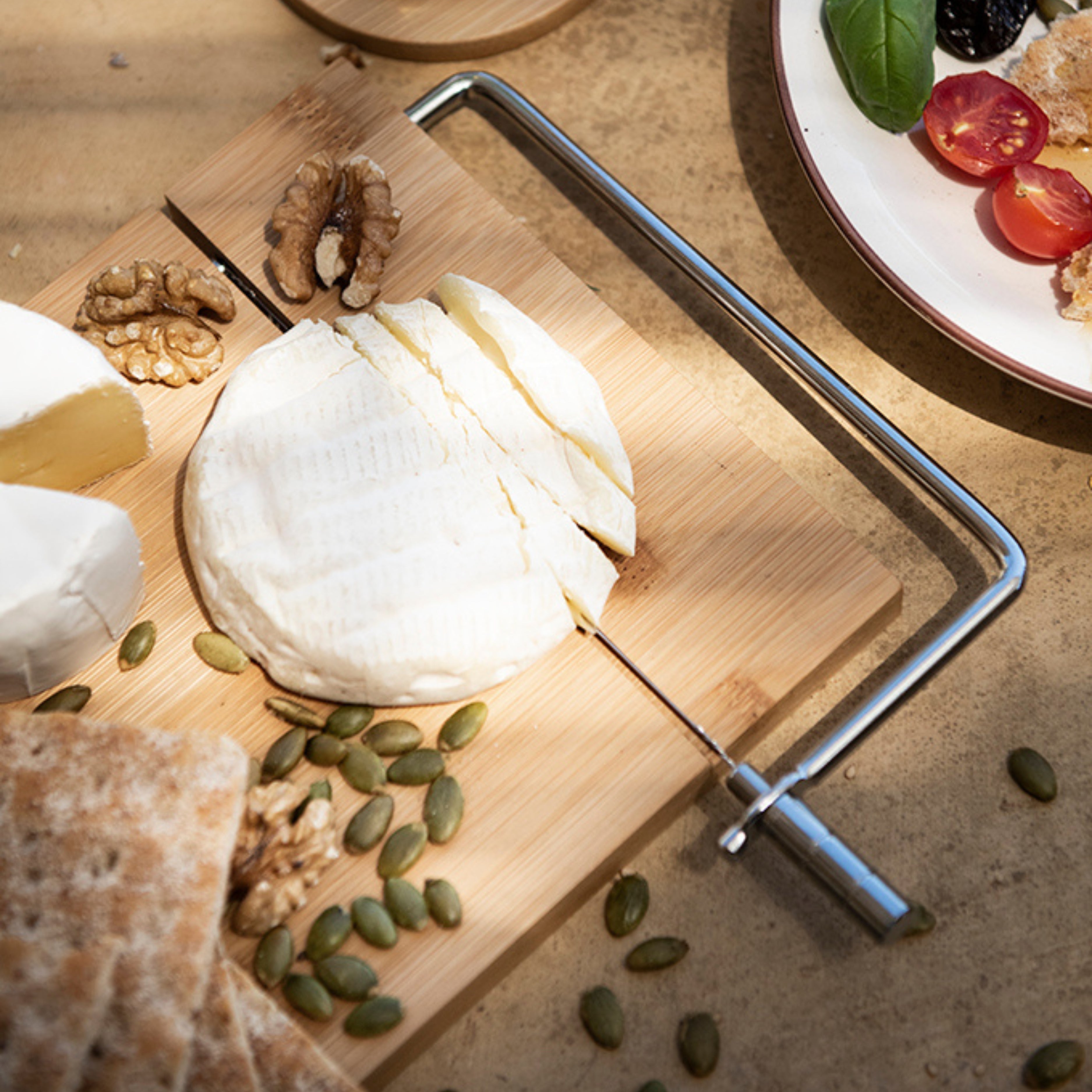 Tabla de bambú para cortar queso