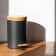 Modern black metal bathroom waste bin