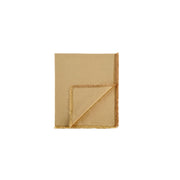 Camino de mesa beige de lino con flecos