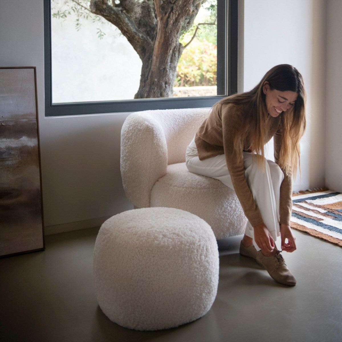 Puf de borreguito blanco Dana