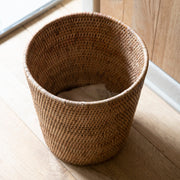 Round rattan waste bin